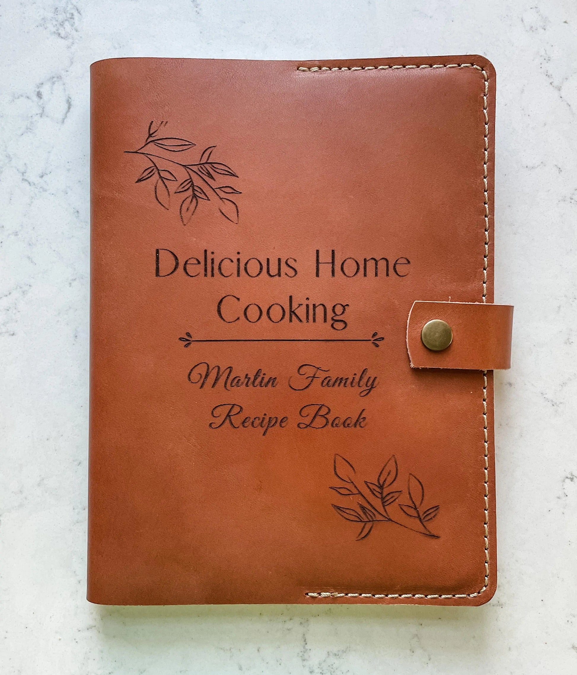 https://www.roreyscraftedgifts.com/cdn/shop/products/Personalized-Gift_-Leather-Recipe-Book-Rorey-s-Crafted-Gifts-1667768485.jpg?v=1667768487&width=1946